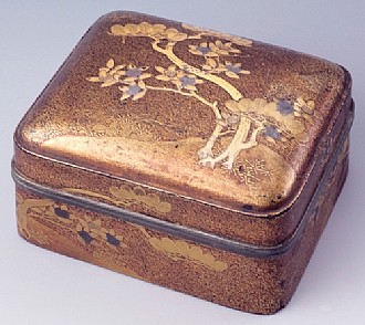 Incense Box (kogo) 

Pine and Tachibana Trees (citrus nobilis) 

Anonymous artist    

Lacquered wood, lead rim 

Design in gold takamaki-e on nashiji 

Early 17th c. 

9.1 x 7.5 x 5 cm