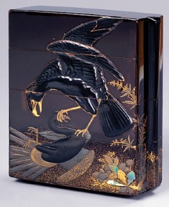 Inro (container for a seal), 4 sections 

Eagle Seizing a Pheasant 

Signature: Kajikawa 

Seal: Sakae 

Lacquered wood, gold and silver takamaki-e mother-of-pearl inlay 

First half of the 19th c. 

6.9 x 6.3 x 2.5 cm