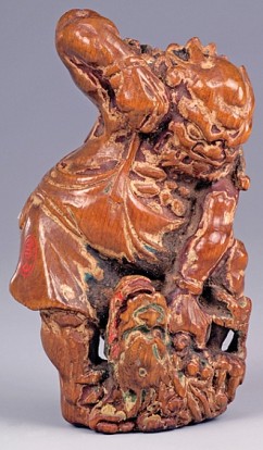 Katabori Netsuke, Oni (demon) Fighting a Dragon 

Yoshimura Shuzan  

Signature: Shuzan 

Japanese cypress (Hinoki) and slight colour 

Mid 18th c. 

Height: 7.4 cm