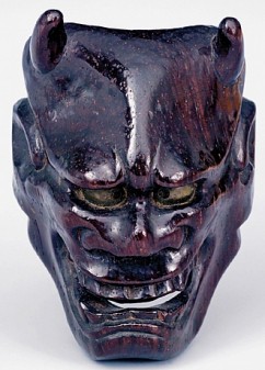 Netsuke Mask, Hannya 

Signature: Deme Uman 

Sandalwood 

Third quarter of the 18th c. 

Height: 5.4 cm