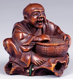 Katabori Netsuke, Hanasaka-jiji with a Basket of Ashes, Sitting on a Log 

Ryumin (1840 - ?) 

Wood 

Second half of the 19th c. 

Height: 4.5 cm