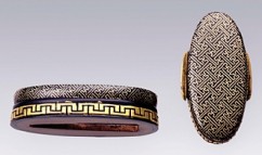 Fuchi and Kashira (Sword Hilt Accessories) 

Rinzu Pattern 

Kaga School 

Shakudo (copper, bronze and gold alloy) 

Gold inlay 

18th c. 

Fuchi: 3.8 cm, Kashira: 3.5 cm