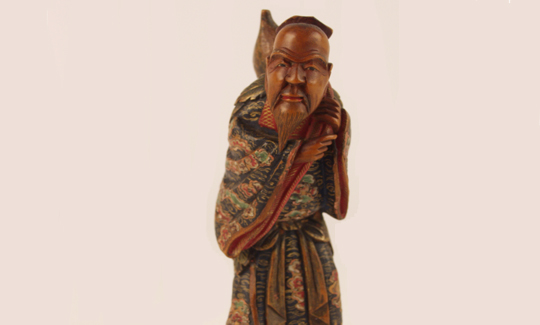 סנין נושא בקבוק-דלעת על